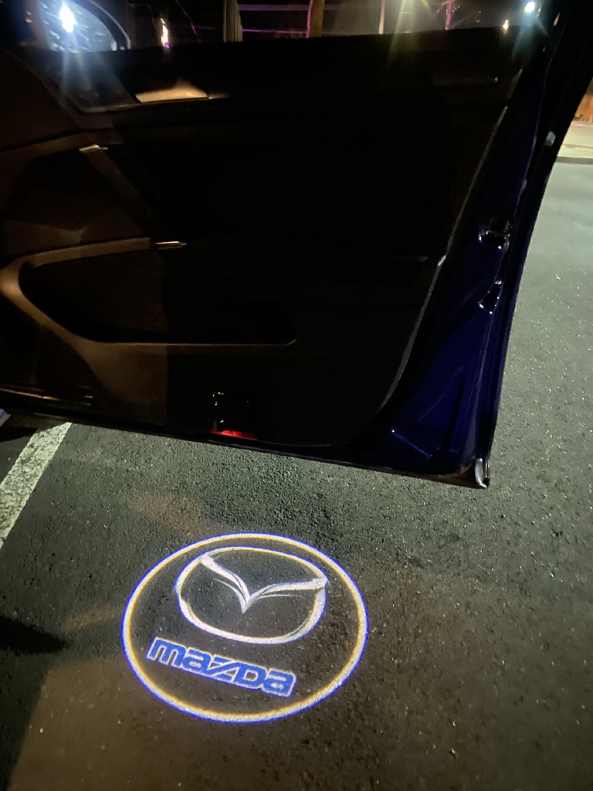Mazda Door Logo Lights